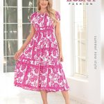 שמלת קיץ בעיצוב Lubna Fashion  היא מתאפיינת בהדפס פרחוני ייחודי בגווני ורוד ולבן.